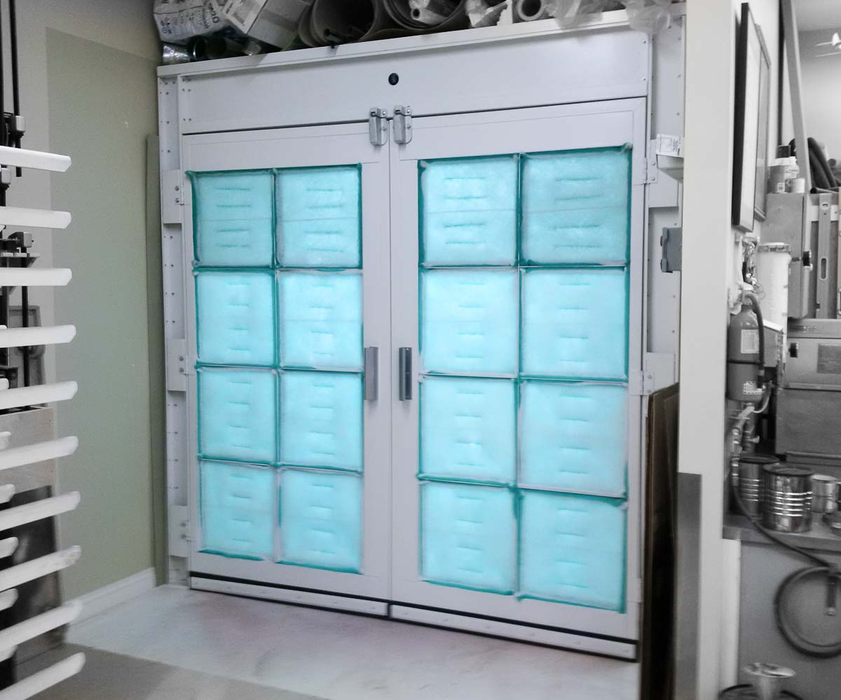 Used Closed Spray Booth with 2 Filtered Barn Doors Coast Machinery Group
