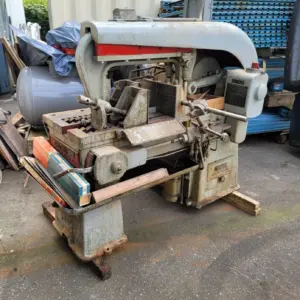Used Racine Hydraulic Metal Saw with feeder platform for sale